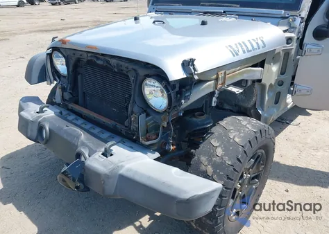 2016 Jeep Wrangler Unlimited Willys Wheeler z USA, uszkodzony, nr VIN 1C4BJWDG2GL283588